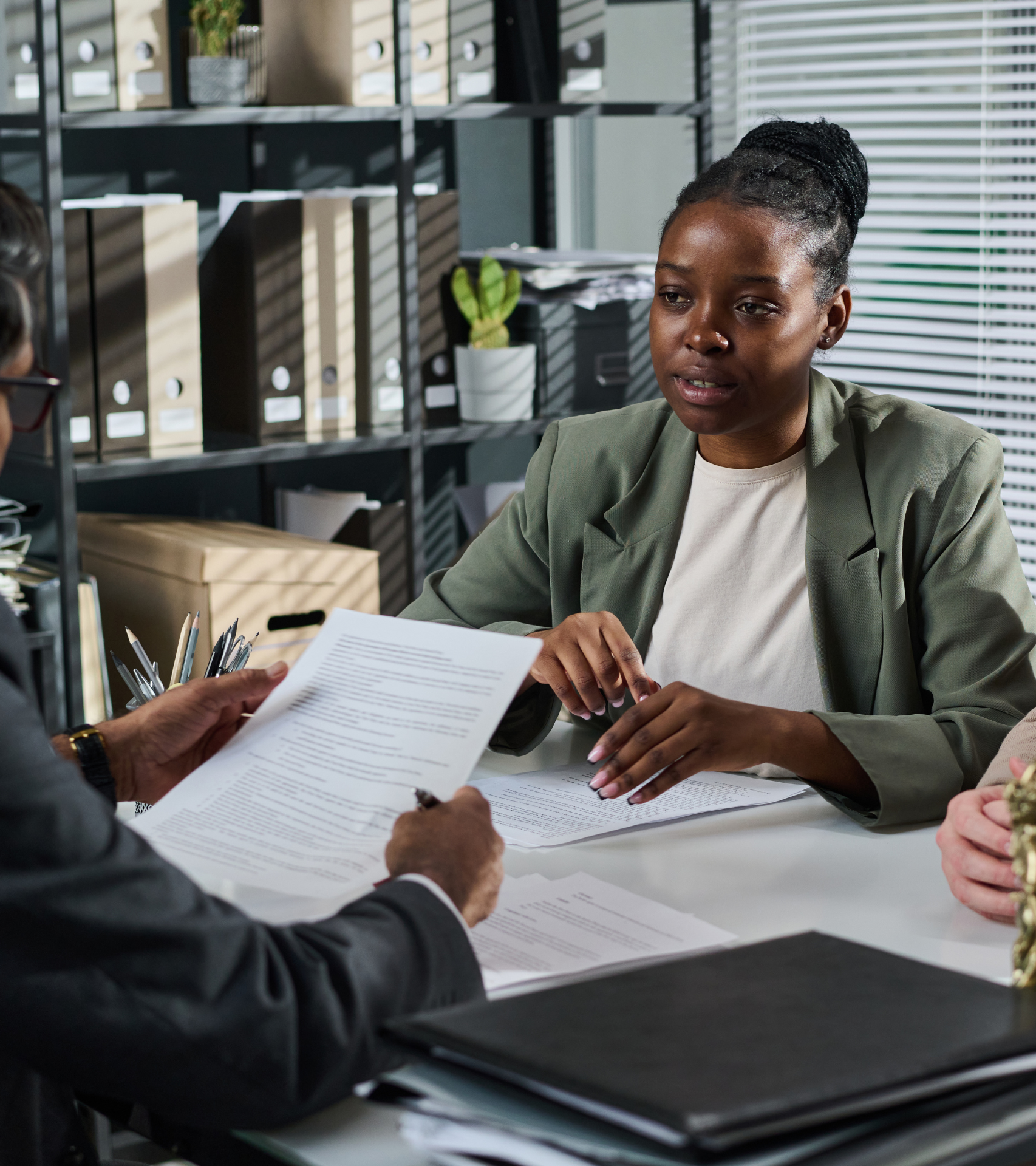 Client and notary discussing legal paperwork